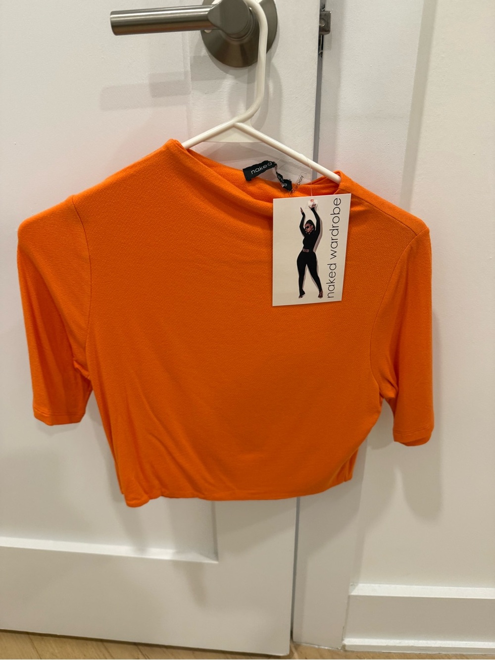 NEW WITH TAGS!  Naked Wardrobe Cropped Tee